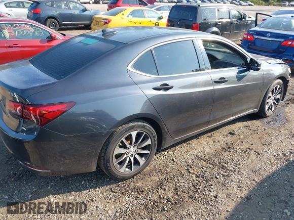 2015 Acura TLX with VIN 19UUB1F31FA023293, listed as a IAAI auction lot 40310652 with 117,350 mi miles. Bid and sale history available at carsss.com. Image 4.