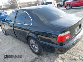 2003 BMW 5 Series 530iA with VIN WBADT63443CK45443, listed as a IAAI auction lot 41380177 with 156,472 mi miles. Bid and sale history available at carsss.com. Image 3.