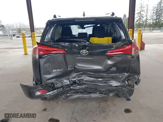 2018 Toyota RAV4 SE with VIN JTMJFREV4JJ742585, listed as a IAAI auction lot 41812675 with 51,672 mi miles. Bid and sale history available at carsss.com. Image 16.