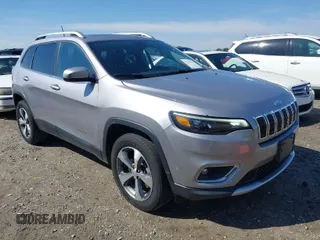 2021 Jeep Cherokee Limited with VIN 1C4PJMDX5MD119056, listed as a IAAI auction lot 41828573 with 56,507 mi miles. Bid and sale history available at carsss.com. Image 1.