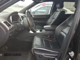 2014 Jeep Grand Cherokee Overland with VIN 1C4RJECG1EC556155, listed as a Copart auction lot 75641034 with 116,549 mi miles and Salvage Title. Bid and sale history available at carsss.com. Image 7.