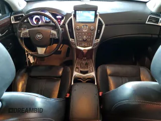 2012 Cadillac SRX Premium Collection z VIN 3GYFNFE30CS599863, wystawiony jako Copart lot #61249995 z przebiegiem 144 740 mil mil oraz Czysty tytuł • Clean title. Historia ofert i sprzedaży dostępna na DreamBid. Obrazek 8.
