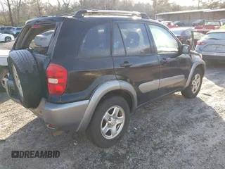 2005 Toyota RAV4 with VIN JTEGD20V250088126, listed as a IAAI auction lot 41601577 with 215,201 mi miles. Bid and sale history available at carsss.com. Image 4.