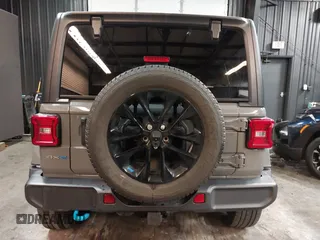 2022 Jeep Wrangler Unlimited Sahara with VIN 1C4JJXP66NW198723, listed as a IAAI auction lot 41368728 with 31,814 mi miles and . Bid and sale history available at DreamBid. Image 16.