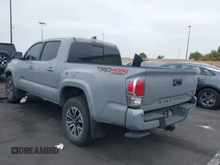 2021 Toyota Tacoma SR with VIN 3TMCZ5AN2MM405869, listed as a IAAI auction lot 42094533 with 78,449 mi miles and . Bid and sale history available at DreamBid. Image 15.