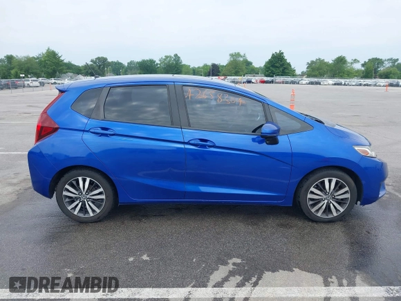 2016 Honda Fit EX z VIN JHMGK5H71GX041650, wystawiony jako IAAI lot #42658304 z przebiegiem 142 904 mil mil oraz . Historia ofert i sprzedaży dostępna na DreamBid. Obrazek 13.