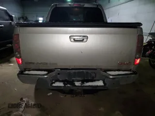 2010 GMC Canyon z VIN 1GTJTFDE0A8105967, wystawiony jako Copart lot #42169555 z przebiegiem 230 257 mil mil oraz Czysty tytuł • Clean title. Historia ofert i sprzedaży dostępna na DreamBid. Obrazek 6.