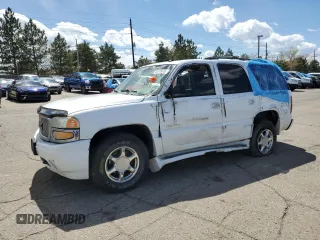 2004 GMC Yukon Denali z VIN 1GKEK63U64J242698, wystawiony jako Copart lot #53755665 z przebiegiem Nie podano mil oraz Szkoda całkowita • Salvage title. Historia ofert i sprzedaży dostępna na DreamBid. Obrazek 1.