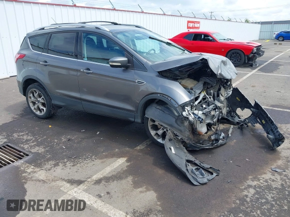 2013 Ford Escape Titanium with VIN 1FMCU9J95DUC95061, listed as a IAAI auction lot 42293047 with 124,641 mi miles and . Bid and sale history available at DreamBid. Image 1.