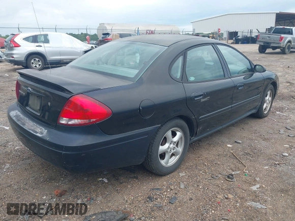 2004 Ford Taurus SE with VIN 1FAFP53U34A107793, listed as a IAAI auction lot 42190553 with 195,459 mi miles and . Bid and sale history available at DreamBid. Image 4.