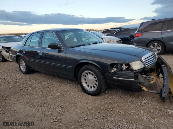 1998 Ford Crown Victoria LX with VIN 2FAFP74W9WX171309, listed as a Copart auction lot 80585734 with 192,162 mi miles and Salvage Title. Bid and sale history available at carsss.com. Image 4.