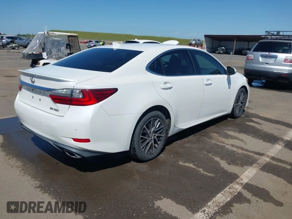 2016 Lexus ES with VIN JTHBK1GG4G2234151, listed as a IAAI auction lot 42004701 with 146,639 mi miles. Bid and sale history available at carsss.com. Image 4.
