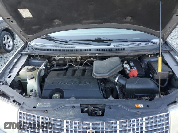 2009 Lincoln MKX with VIN 2LMDU88C69BJ13322, listed as a Copart auction lot 70686844 with 129,384 mi miles and Salvage Title. Bid and sale history available at DreamBid. Image 13.