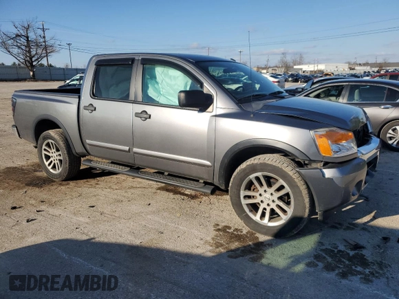 2015 Nissan Titan SV with VIN 1N6AA0EC5FN501124, listed as a Copart auction lot 87291164 with 195,448 mi miles and Salvage title. Bid and sale history available at DreamBid. Image 4.
