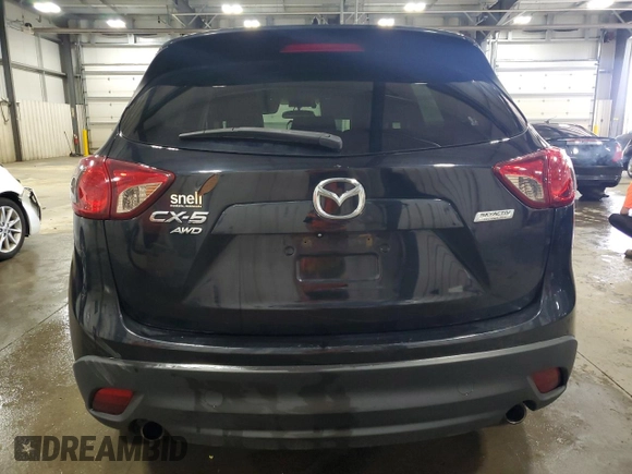 2014 Mazda CX-5 Grand Touring with VIN JM3KE4DY0E0322606, listed as a Copart auction lot 54381815 with 216,022 mi miles and Salvage Title. Bid and sale history available at DreamBid. Image 6.