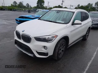 2019 BMW X1 xDrive28i with VIN WBXHT3C54K3H35641, listed as a IAAI auction lot 42241894 with 100,989 mi miles and . Bid and sale history available at DreamBid. Image 2.