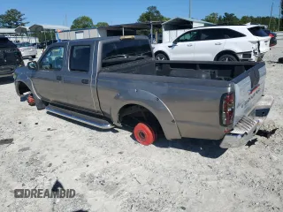 2004 Nissan Frontier XE z VIN 1N6ED29X94C473256, wystawiony jako Copart lot #57796125 z przebiegiem 306 316 mil mil oraz Czysty tytuł • Clean title. Historia ofert i sprzedaży dostępna na DreamBid. Obrazek 2.