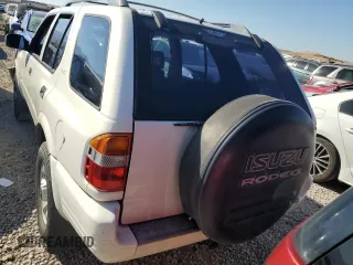 1999 Isuzu Rodeo S z VIN 4S2CM58W0X4306727, wystawiony jako Copart lot #74758994 z przebiegiem 193 850 mil mil oraz Tytuł czysty. Historia ofert i sprzedaży dostępna na DreamBid. Obrazek 6.