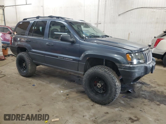 2004 Jeep Grand Cherokee Laredo with VIN 1J4GW48S24C294185, listed as a Copart auction lot 53357945 with 209,169 mi miles and Clean Title. Bid and sale history available at carsss.com. Image 4.