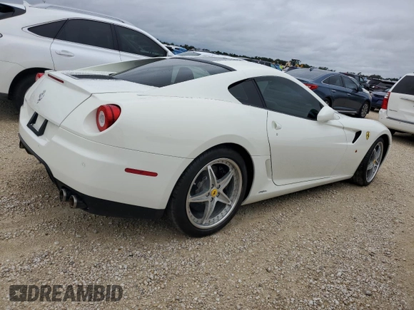 2010 Ferrari 599 z VIN ZFF60FCA0A0173683, wystawiony jako Copart lot #74913514 z przebiegiem Nie podano mil oraz Szkody całkowita. Historia ofert i sprzedaży dostępna na DreamBid. Obrazek 3.
