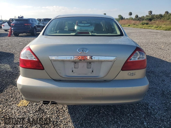 2003 Infiniti Q45 z VIN JNKBF01A93M103010, wystawiony jako Copart lot #74080224 z przebiegiem 46 898 mil mil oraz Szkoda całkowita • Salvage title. Historia ofert i sprzedaży dostępna na DreamBid. Obrazek 6.