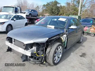 2014 Audi A4 Premium with VIN WAUAFAFL0EA072745, listed as a IAAI auction lot 41469342 with 114,881 mi miles. Bid and sale history available at carsss.com. Image 2.