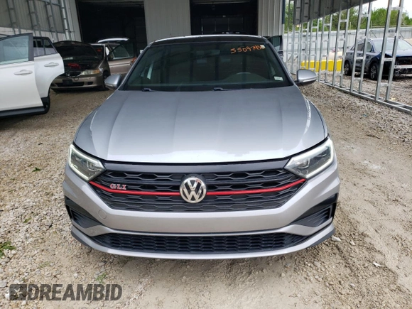 2019 Volkswagen Jetta GLI S z VIN 3VW6T7BU4KM222404, wystawiony jako Copart lot #55097435 z przebiegiem 121 664 mil mil oraz Szkoda całkowita • Salvage title. Historia ofert i sprzedaży dostępna na DreamBid. Obrazek 5.