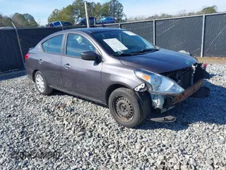 2015 Nissan Versa SV with VIN 3N1CN7AP6FL827678, listed as a IAAI auction lot 41422007 with 164,141 mi miles. Bid and sale history available at carsss.com. Image 1.