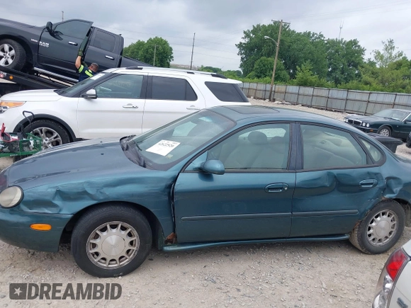 1996 Ford Taurus LX with VIN 1FALP53S3TG177324, listed as a IAAI auction lot 42622520 with 126,979 mi miles and . Bid and sale history available at DreamBid. Image 14.