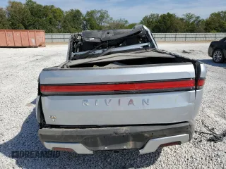 2022 Rivian R1T Launch Edition z VIN 7FCTGAAL5NN003648, wystawiony jako Copart lot #63705013 z przebiegiem Nie podano mil oraz Nie do naprawy. Historia ofert i sprzedaży dostępna na DreamBid. Obrazek 6.