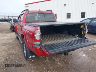 2015 Toyota Tacoma with VIN 3TMLU4EN8FM189953, listed as a IAAI auction lot 41584110 with 126,833 mi miles and . Bid and sale history available at DreamBid. Image 3.