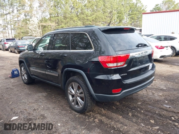 2012 Jeep Grand Cherokee Laredo with VIN 1C4RJEAG0CC316823, listed as a IAAI auction lot 41846479 with 215,317 mi miles. Bid and sale history available at carsss.com. Image 3.