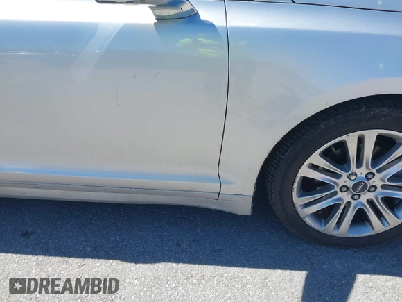 2014 Lincoln MKZ Hybrid with VIN 3LN6L2LU2ER814603, listed as a IAAI auction lot 39576919 with 116,367 mi miles and . Bid and sale history available at DreamBid. Image 12.