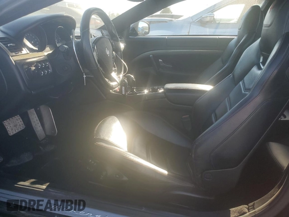 2013 Maserati GranTurismo Sport с VIN ZAM45VLA5D0074293, выставлен на аукционе Copart как лот 76071204 с пробегом 34 297 миль миль и Списание • Salvage title. История ставок и продаж доступна на DreamBid. Изображение 7.