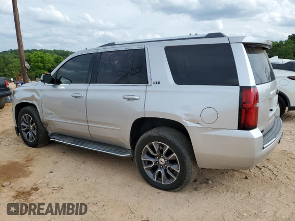 2015 Chevrolet Tahoe LTZ z VIN 1GNSKCKC0FR198361, wystawiony jako Copart lot #54220155 z przebiegiem 176 429 mil mil oraz Szkoda całkowita • Salvage title. Historia ofert i sprzedaży dostępna na DreamBid. Obrazek 2.