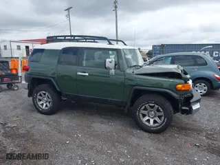 2014 Toyota FJ Cruiser with VIN JTEBU4BF1EK203587, listed as a IAAI auction lot 41978010 with 62,438 mi miles. Bid and sale history available at carsss.com. Image 13.