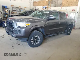 2021 Toyota Tacoma SR with VIN 3TMCZ5AN5MM378375, listed as a Copart auction lot 63806325 with 47,061 mi miles and Salvage title. Bid and sale history available at DreamBid. Image 1.