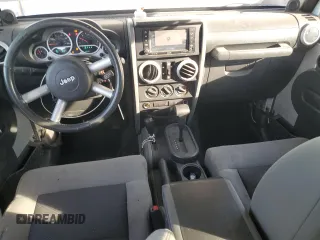 2010 Jeep Wrangler Unlimited Sahara with VIN 1J4HA5H13AL184449, listed as a Copart auction lot 43421945 with 176,725 mi miles and Salvage Title. Bid and sale history available at carsss.com. Image 8.