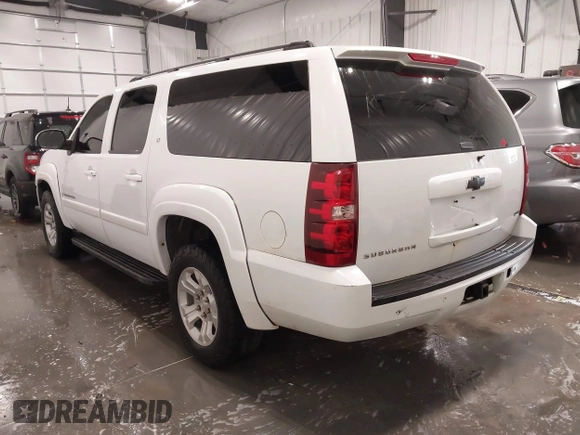 2007 Chevrolet Suburban LT with VIN 1GNFK16307J240138, listed as a IAAI auction lot 42039221 with 212,689 mi miles and . Bid and sale history available at DreamBid. Image 3.