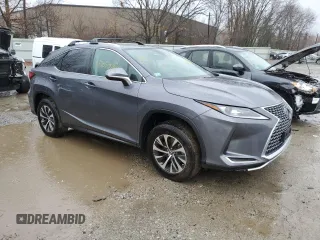 2021 Lexus RX with VIN 2T2HZMDA8MC301917, listed as a Copart auction lot 72053082 with 5,878 mi miles. Bid and sale history available at carsss.com. Image 4.