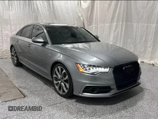 2014 Audi A6 Prestige z VIN WAUHGAFC5EN015025, wystawiony jako Copart lot #61234845 z przebiegiem 119 231 mil mil oraz Czysty tytuł • Clean title. Historia ofert i sprzedaży dostępna na DreamBid. Obrazek 1.