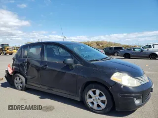 2009 Nissan Versa 1.8 SL with VIN 3N1BC13E49L407318, listed as a Copart auction lot 42192365 with 158,993 mi miles and Salvage Title. Bid and sale history available at carsss.com. Image 4.