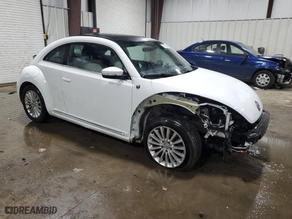 2019 Volkswagen Beetle S with VIN 3VWFD7AT4KM703324, listed as a Copart auction lot 77000024 with 93,346 mi miles and Salvage Title. Bid and sale history available at carsss.com. Image 4.