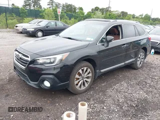 2018 Subaru Outback Touring with VIN 4S4BSETCXJ3232171, listed as a IAAI auction lot 42470956 with 124,650 mi miles and . Bid and sale history available at DreamBid. Image 2.