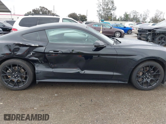 2018 Ford Mustang EcoBoost z VIN 1FA6P8TH3J5129088, wystawiony jako IAAI lot #41792548 z przebiegiem 55 991 mil mil oraz . Historia ofert i sprzedaży dostępna na DreamBid. Obrazek 13.