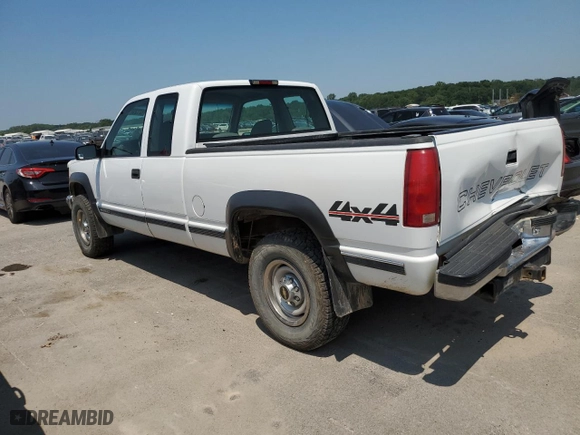 1999 Chevrolet C/K 2500 with VIN 1GCGK29R2XF094752, listed as a Copart auction lot 66548124 with 164,155 mi miles and Salvage Title. Bid and sale history available at carsss.com. Image 2.