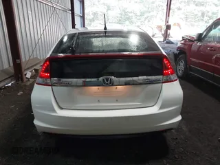 2012 Honda Insight EX with VIN JHMZE2H71CS003132, listed as a IAAI auction lot 42582548 with 112,593 mi miles and . Bid and sale history available at DreamBid. Image 16.