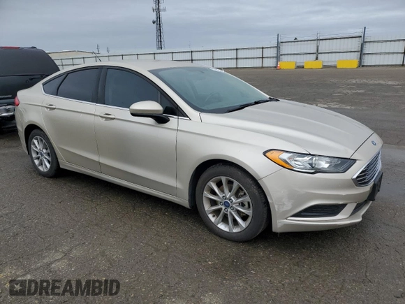 2017 Ford Fusion SE with VIN 3FA6P0HD3HR215984, listed as a Copart auction lot 44459915 with 60,954 mi miles and Salvage Title. Bid and sale history available at DreamBid. Image 4.