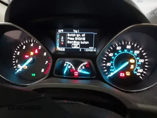 2015 Ford Escape Titanium z VIN 1FMCU0JX9FUB48089, wystawiony jako IAAI lot #41048127 z przebiegiem 133 439 mil mil oraz . Historia ofert i sprzedaży dostępna na DreamBid. Obrazek 7.