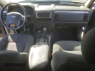 2004 Jeep Grand Cherokee Laredo with VIN 1J4GW48S54C349888, listed as a Copart auction lot 43009574 with 238,247 mi miles and Salvage title. Bid and sale history available at DreamBid. Image 8.